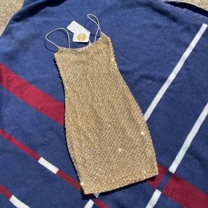 Oh Polly pearly golden sparkly dress
Women’s size US 0